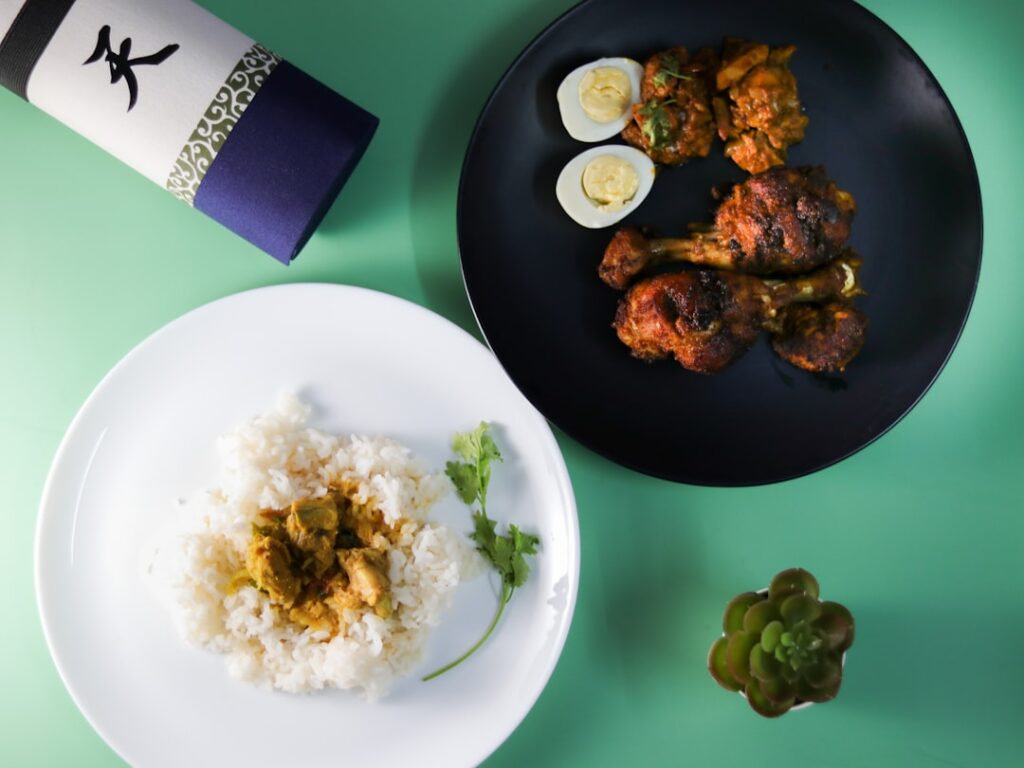 Lutong bahay restaurant branding—Filipino chicken dish, rice, and boiled eggs styled with authentic home-cooked presentation.